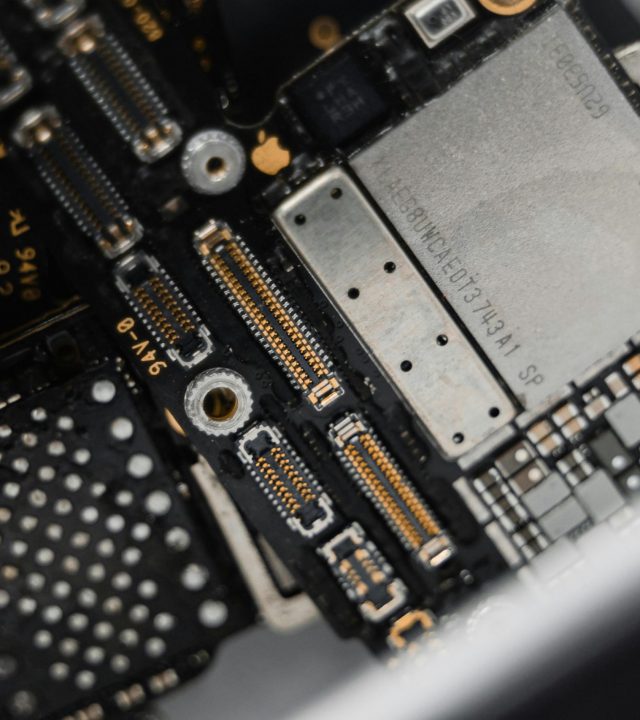 pexels-photo-6755093-6755093 Detailed view of electronic components on a circuit board for maintenance.